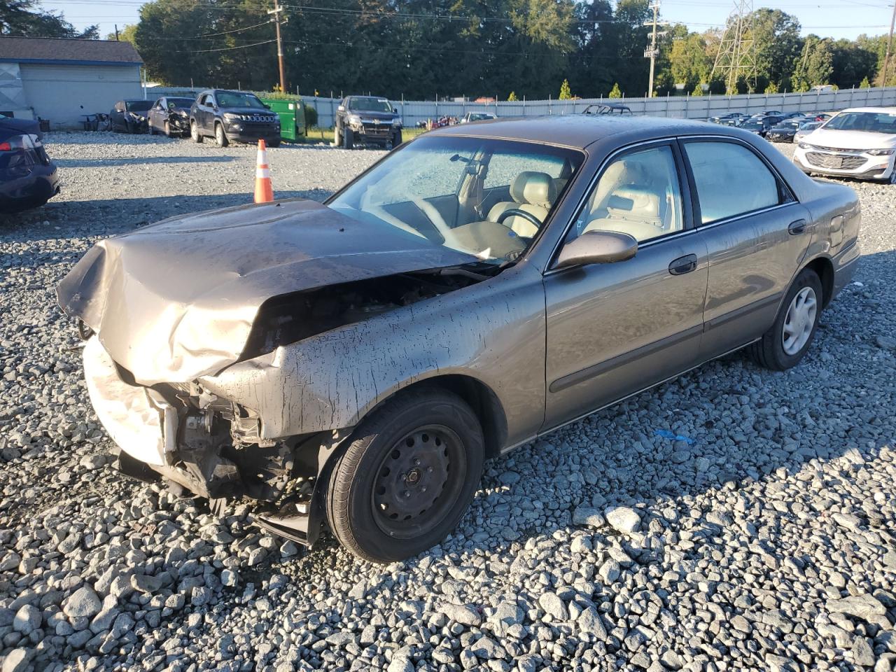 1999 Mazda 626 ES, VIN 1YVGF22C9X5884284 — Front end