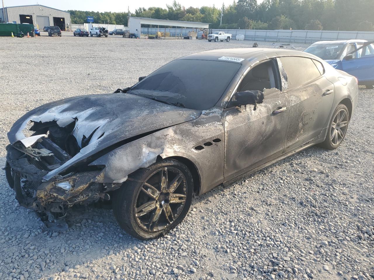 2014 Maserati Quattroporte S Q4, VIN ZAM56RRA5E1084219 — Пожар в моторном отсеке