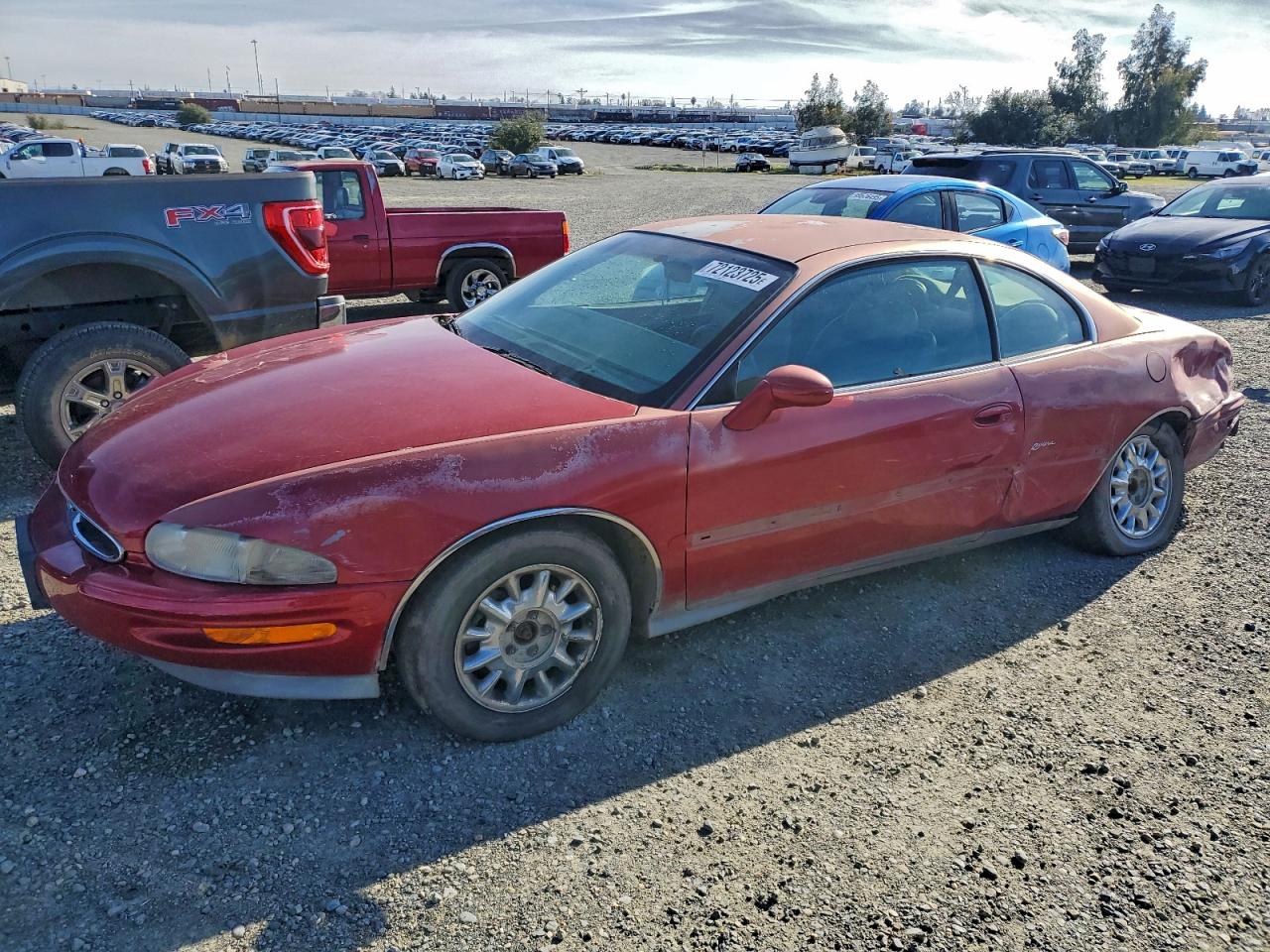 1997 Buick Riviera, VIN 1G4GD2218V4715494 — Side