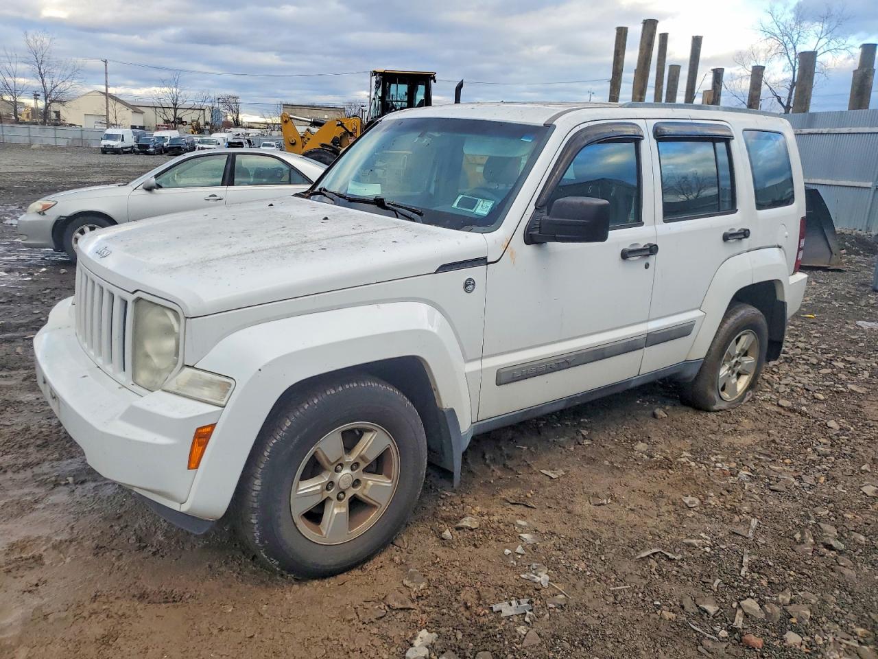 2011 Jeep Liberty Sport, VIN 1J4PN2GK1BW520902 — Зад