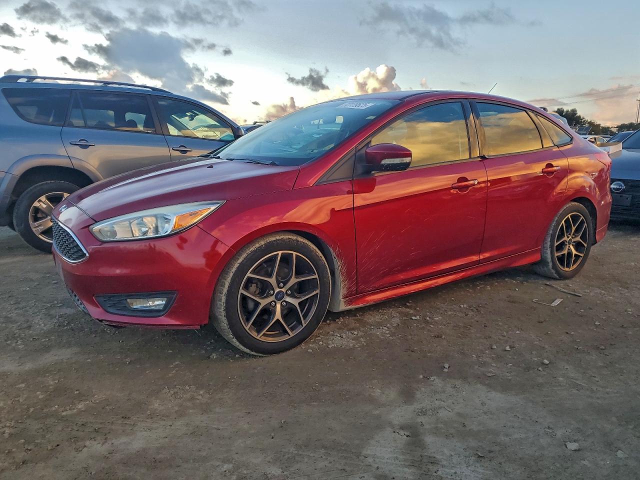 2015 Ford Focus SE, VIN 1FADP3F20FL334498 — Minor dents and scratches