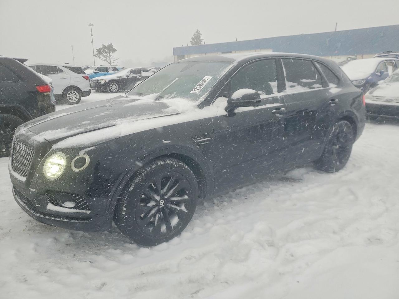 2017 Bentley Bentayga W12, VIN SJAAC2ZV6HC013952 — Rear end