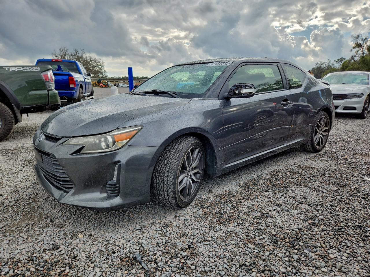2014 Scion tC Monogram, VIN JTKJF5C79E3088036 — Side