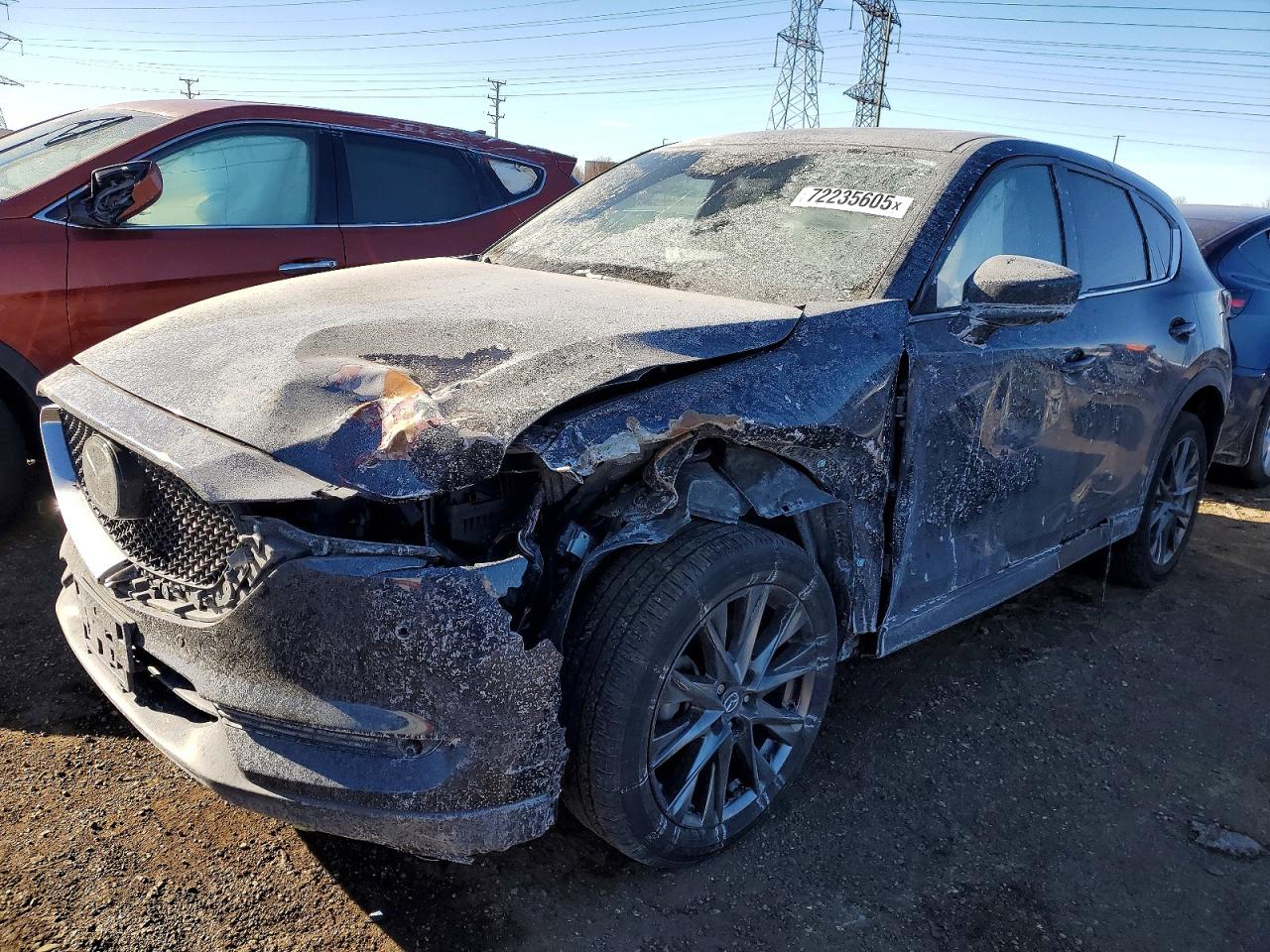 2021 Mazda CX-5 Signature, VIN JM3KFBEY4M0453049 — Front end