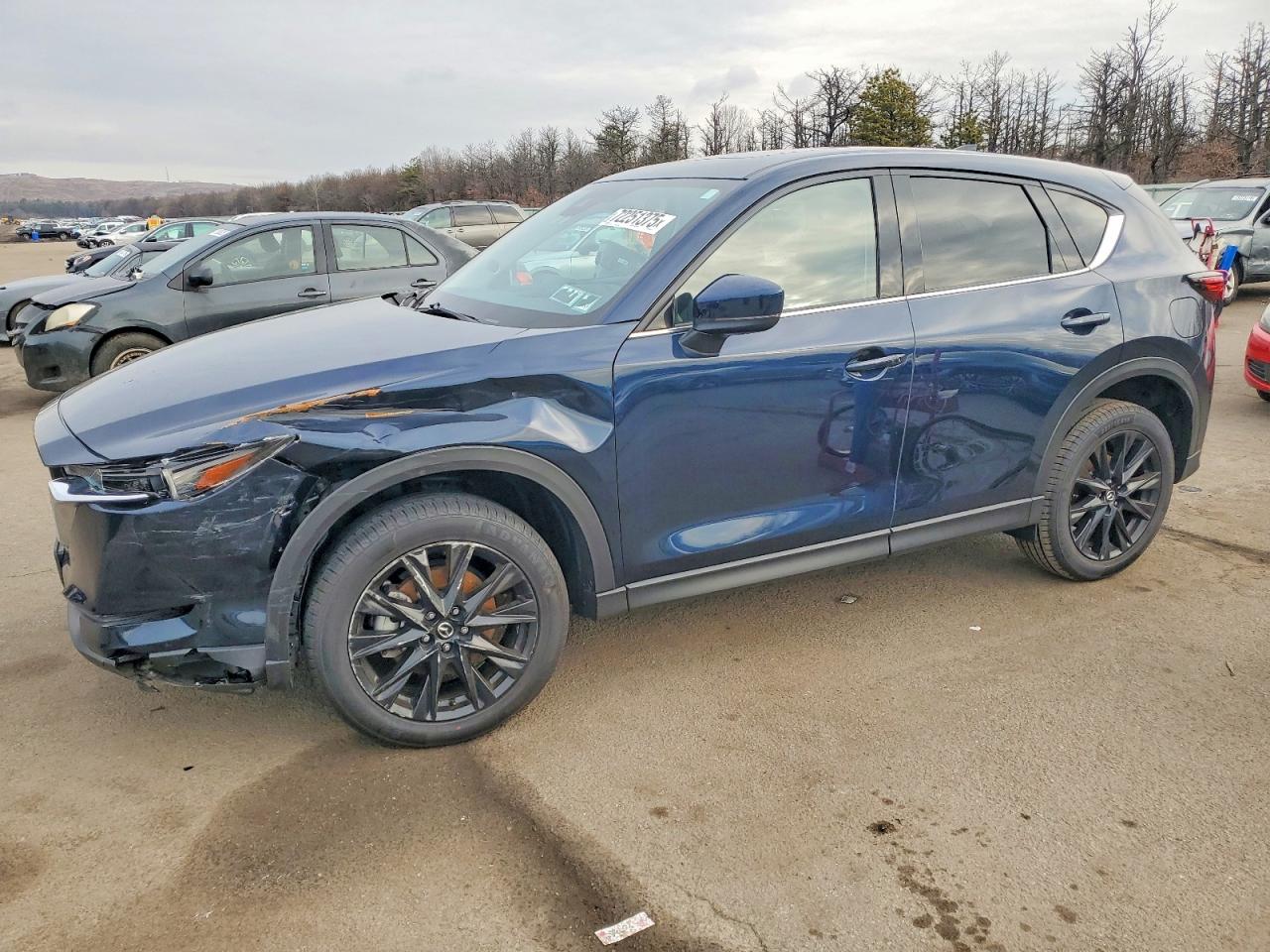 2021 Mazda CX-5 Grand Touring Reserve, VIN JM3KFBAY7M0466271 — Front end