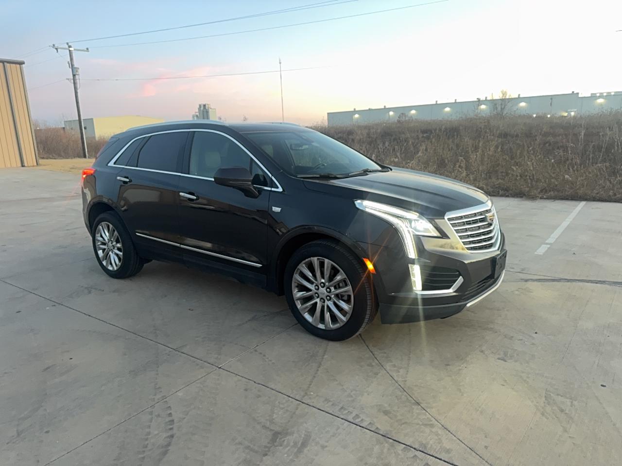 2017 Cadillac XT5 Platinum AWD, VIN 1GYKNFRS8HZ158072 — Prior damage history