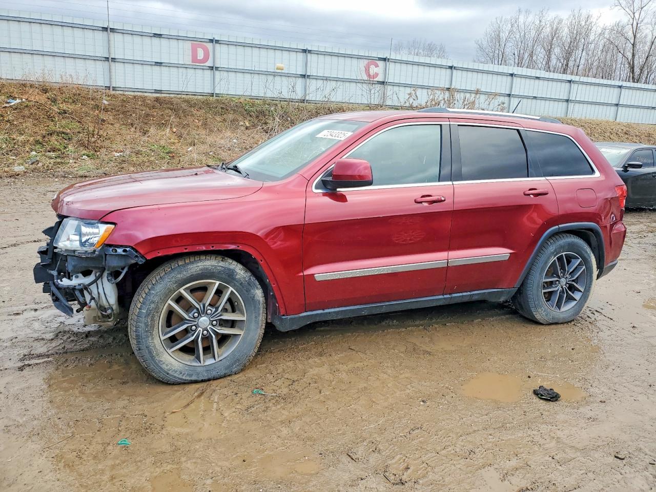 2012 Jeep Grand Cherokee Laredo, VIN 1C4RJFAG3CC246109 — Front end