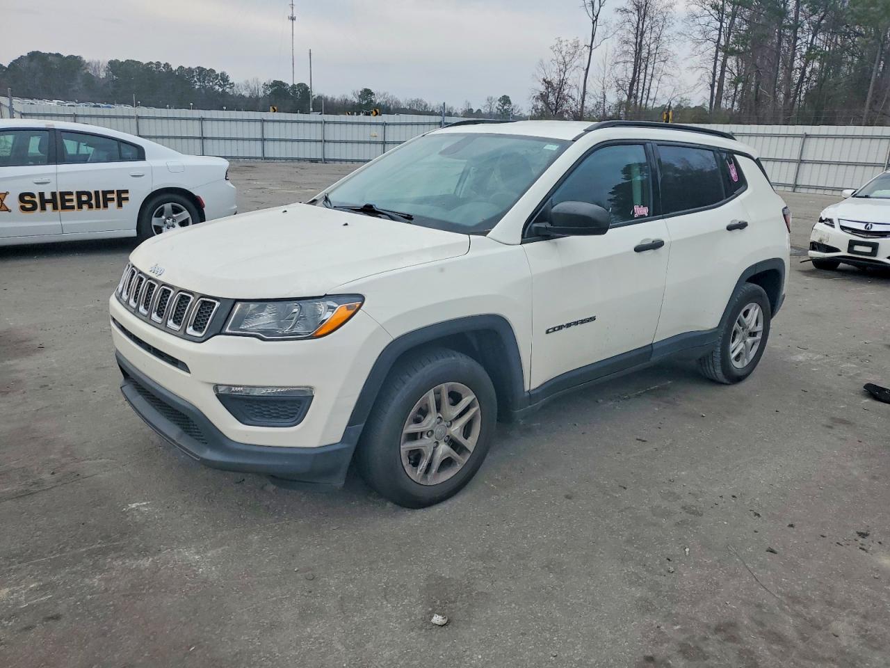 2018 Jeep Compass Sport, VIN 3C4NJCAB9JT462355 — Side