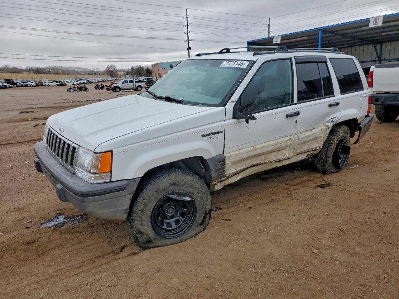 1995 Jeep Grand Cherokee Laredo, VIN 1J4GZ58SXSC635567 — Side