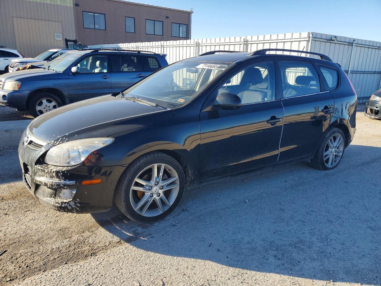 2010 Hyundai Elantra SE, VIN KMHDC8AE1AU077449 — Side