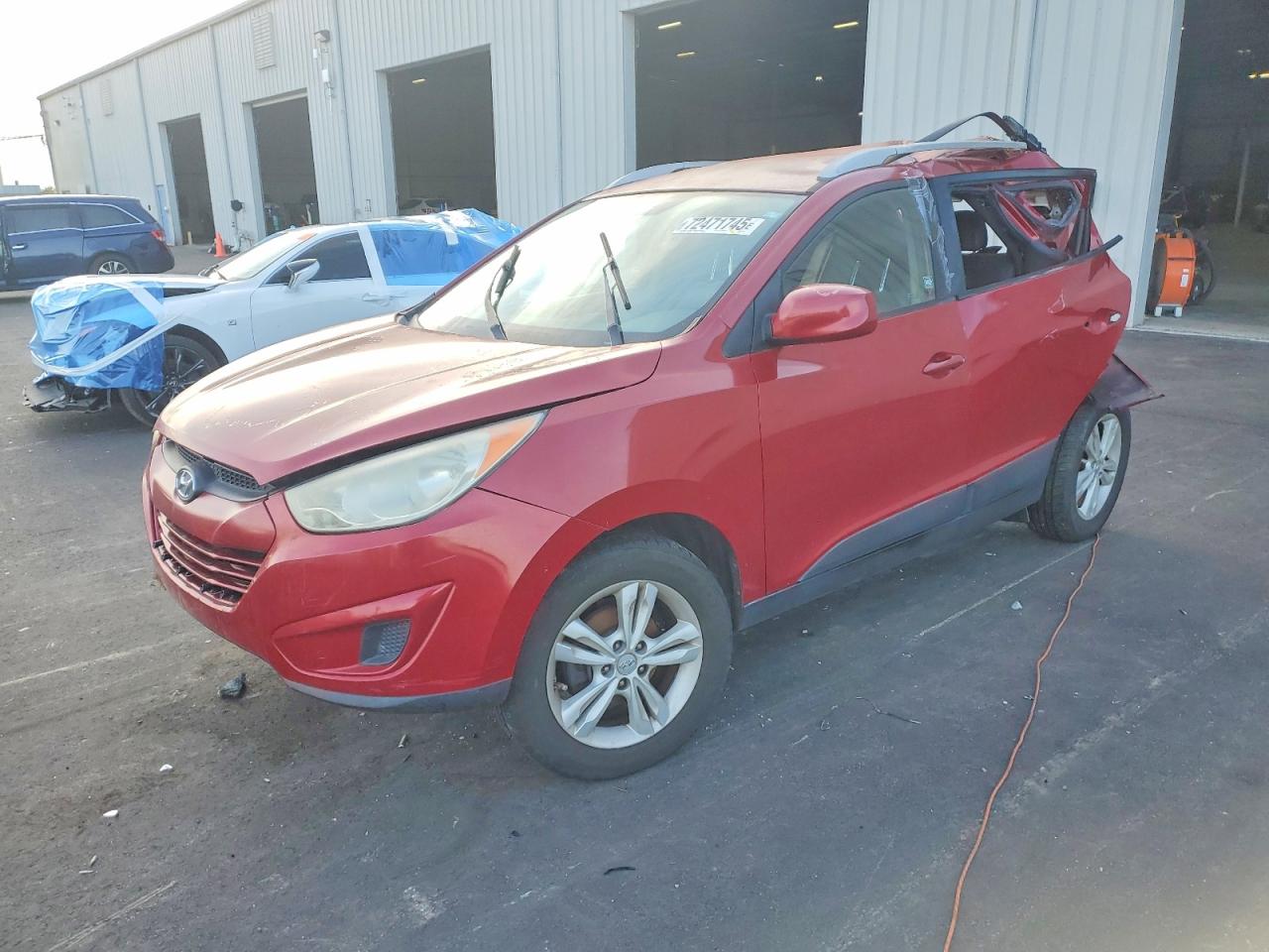 2011 Hyundai Tucson Limited, VIN KM8JU3AC1BU174217 — Rear end
