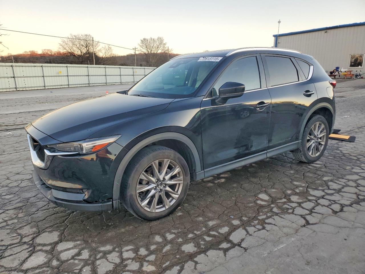 2021 Mazda CX-5 Grand Touring, VIN JM3KFADM2M1391007 — Normal wear