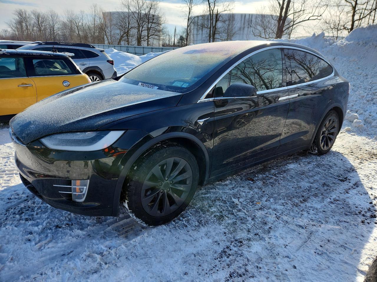 2019 Tesla Model X 75D, VIN 5YJXCBE26KF160738 — Side