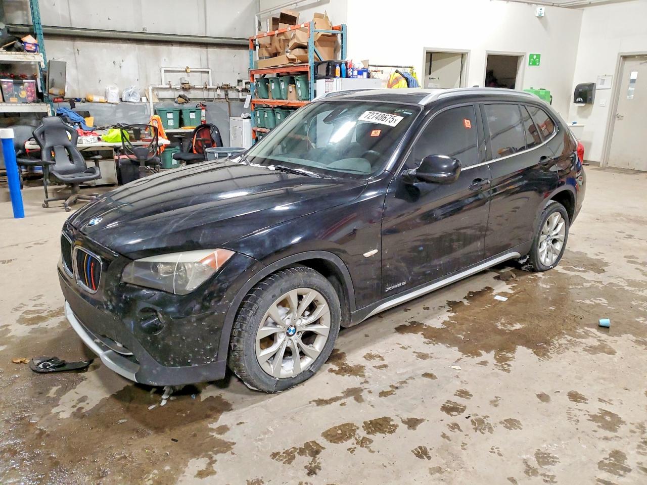 2012 BMW X1 28i, VIN WBAVL1C5XCVR81355 — Side