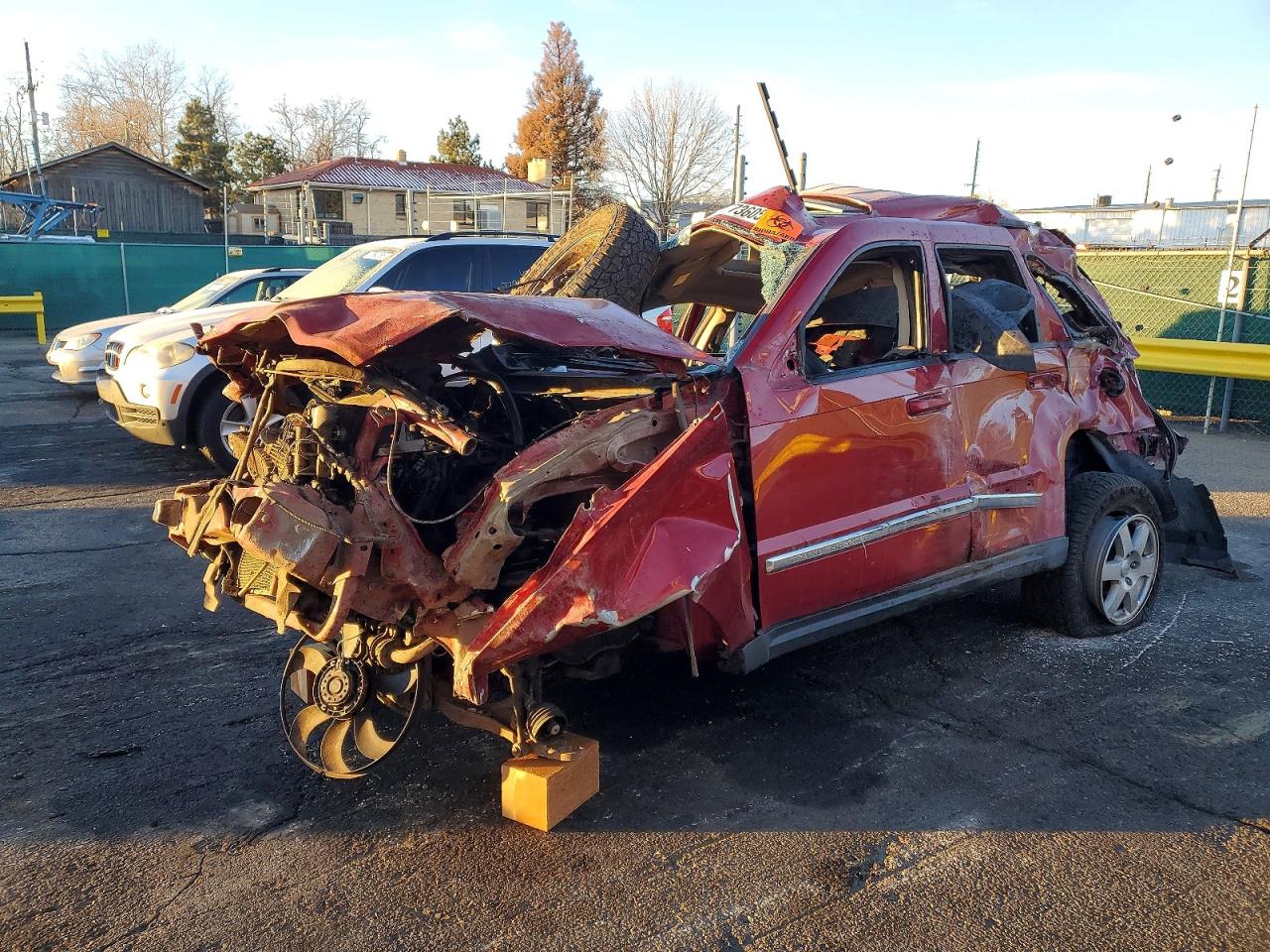 2010 Jeep Grand Cherokee Laredo, VIN 1J4PR4GK0AC127523 — Rollover