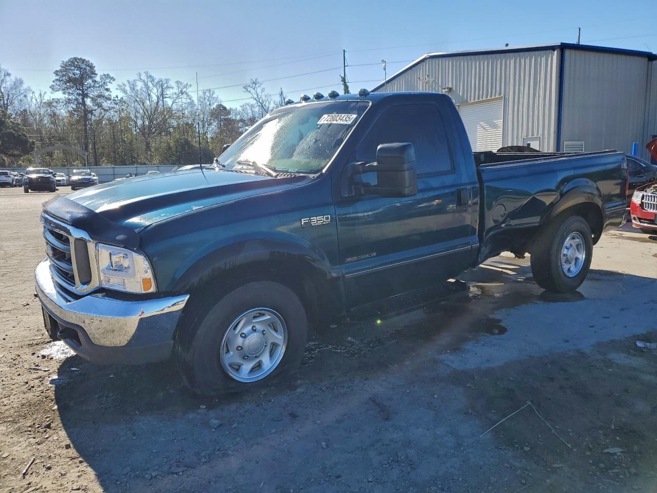 1999 Ford F-350 XL, VIN 1FTSF30F2XEC24672 — Side