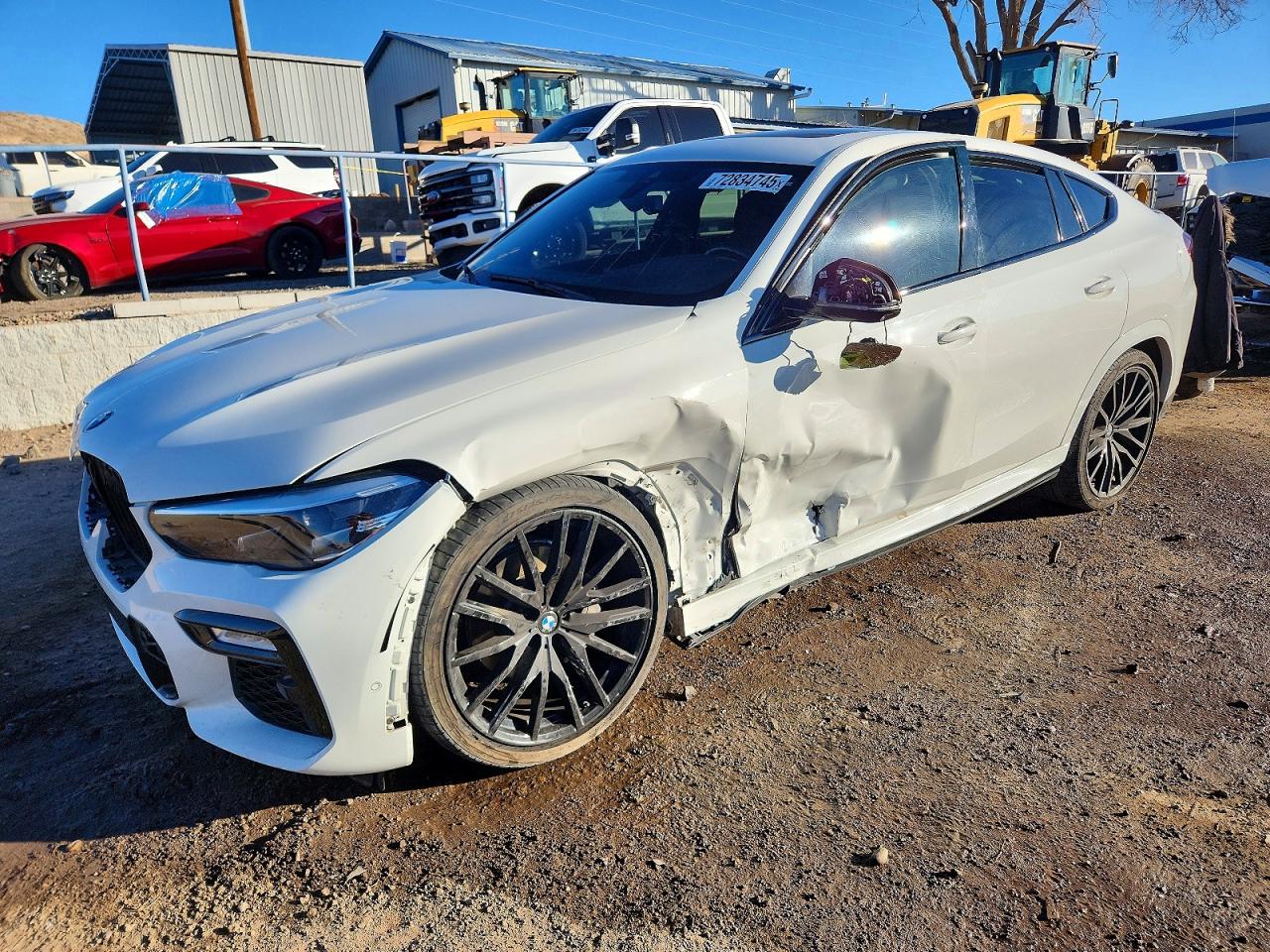 2020 BMW X6 xDrive40i, VIN 5UXCY6C04L9C97246 — Бок