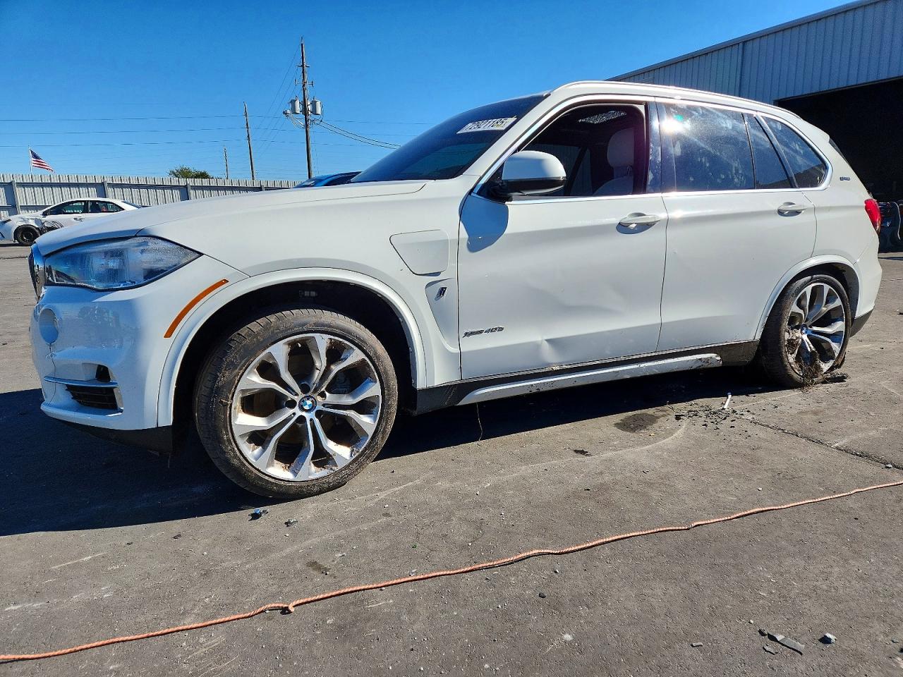 2018 BMW X5 xDrive40e, VIN 5UXKT0C54J0W03976 — Water / flood