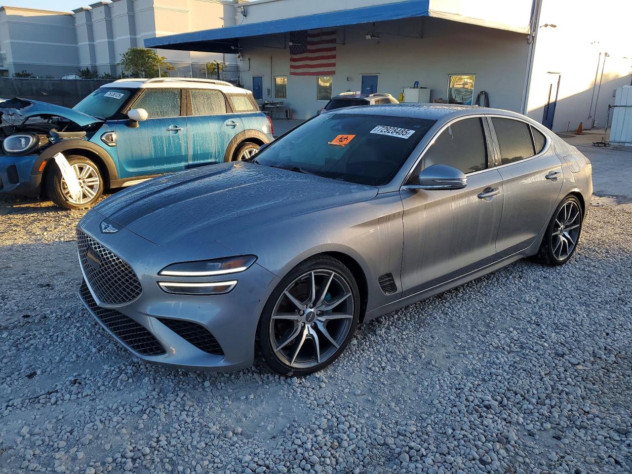 2023 Genesis G70 2.0T, VIN KMTG34TA6PU127034 — Бок
