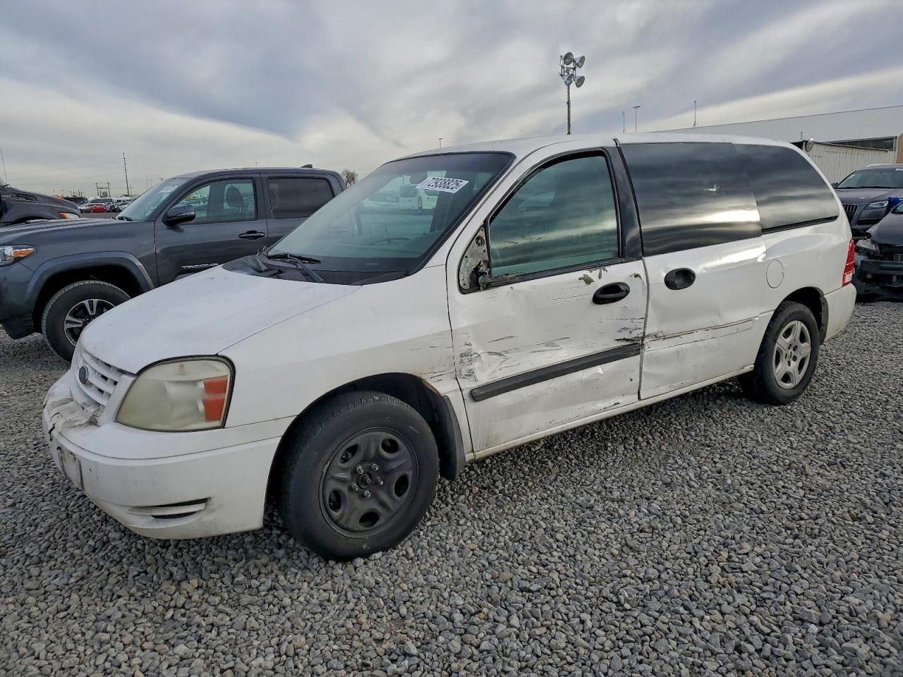 2004 Ford Freestar S, VIN 2FMZA50634BA58383 — Side