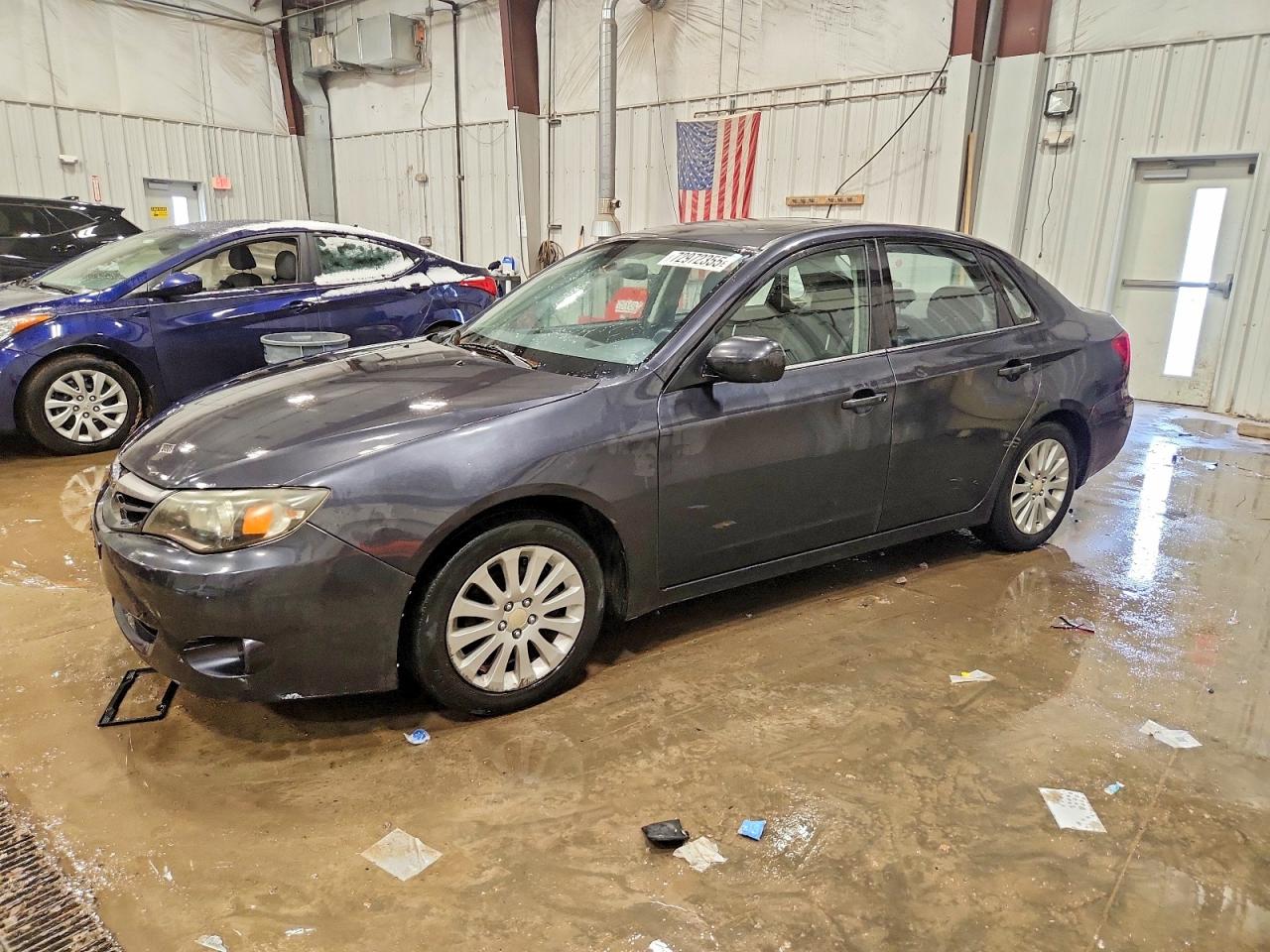 2010 Subaru Impreza i Premium, VIN JF1GE6B69AH510781 — Undercarriage
