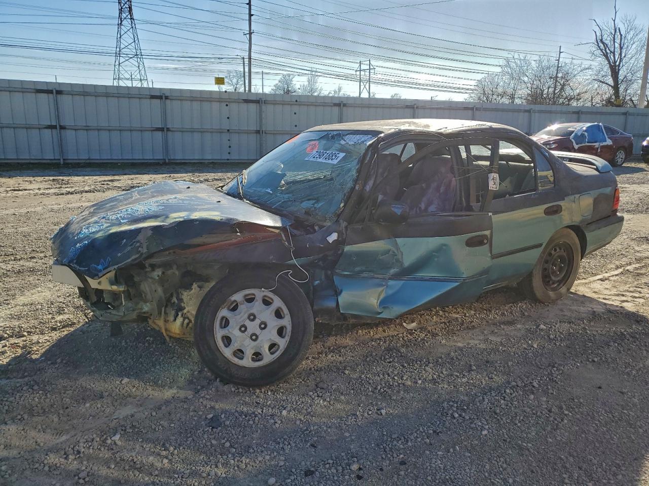 1995 Toyota Corolla DX, VIN 1NXAE09B2SZ337559 — Rollover