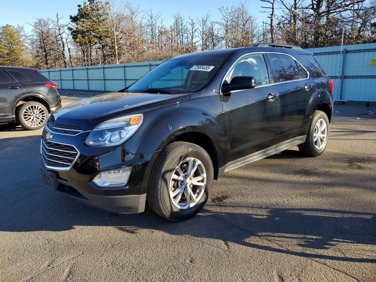 2017 Chevrolet Equinox LT, VIN 2GNFLFEKXH6196439 — Side