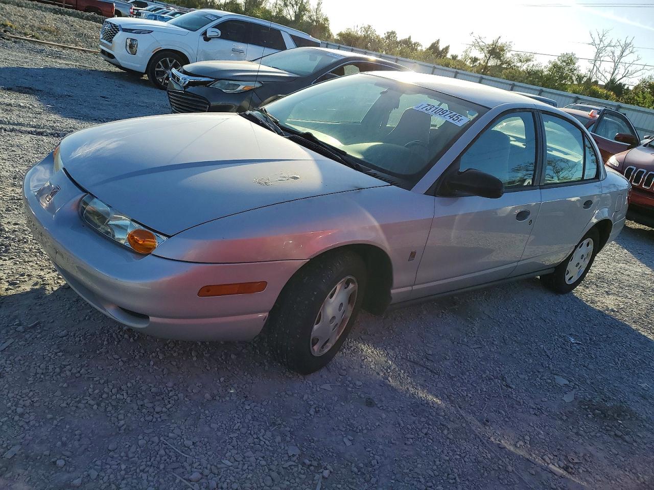 2000 Saturn SL, VIN 1G8ZH5287YZ140922 — Engine fire