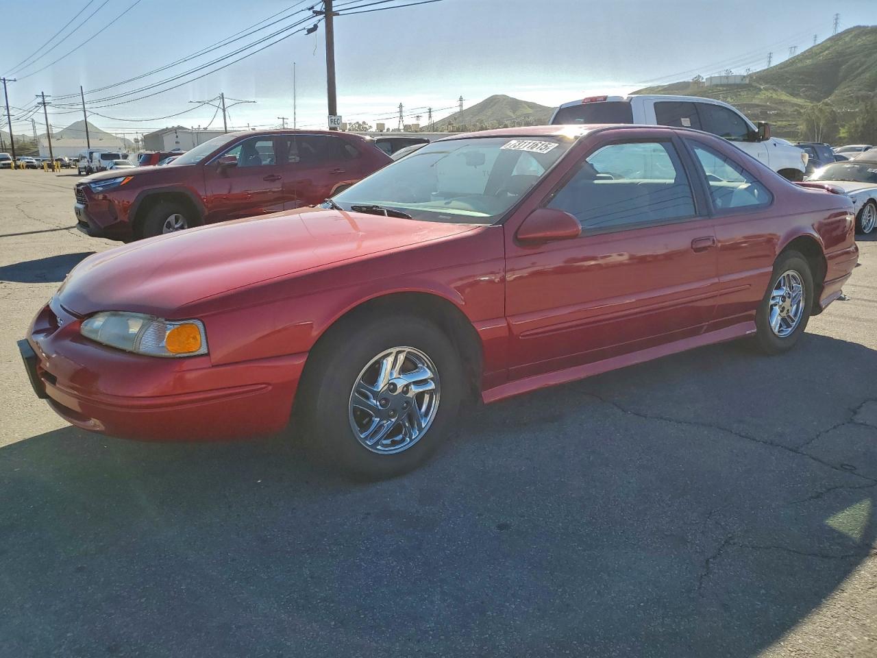 1996 Ford Thunderbird LX, VIN 1FALP62W6TH129028 — Minor dents and scratches