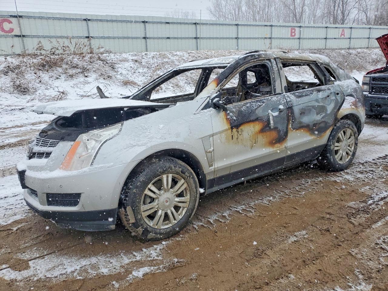 2012 Cadillac SRX Luxury Collection, VIN 3GYFNAE32CS616231 — Пожар в салоне