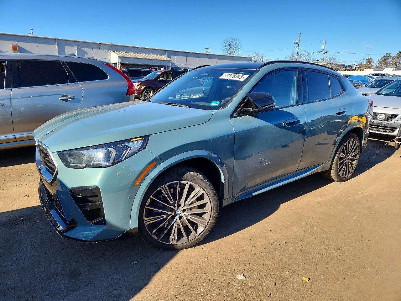 2024 BMW X2 M35i, VIN WBX83GM06R5Z35801 — Бок