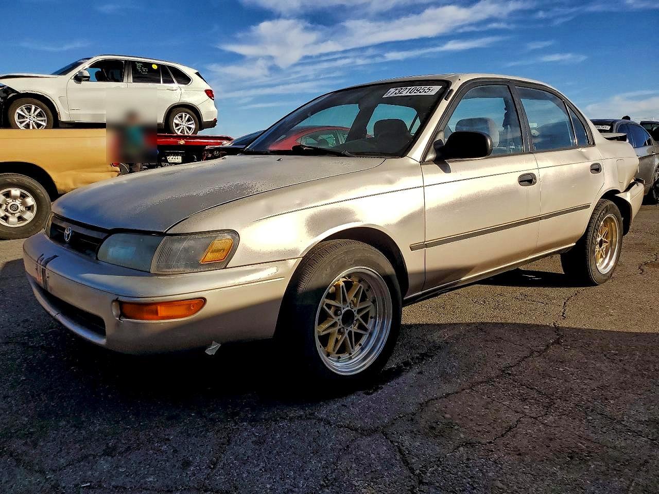 1995 Toyota Corolla DX, VIN 1NXAE09B0SZ317343 — Rear end