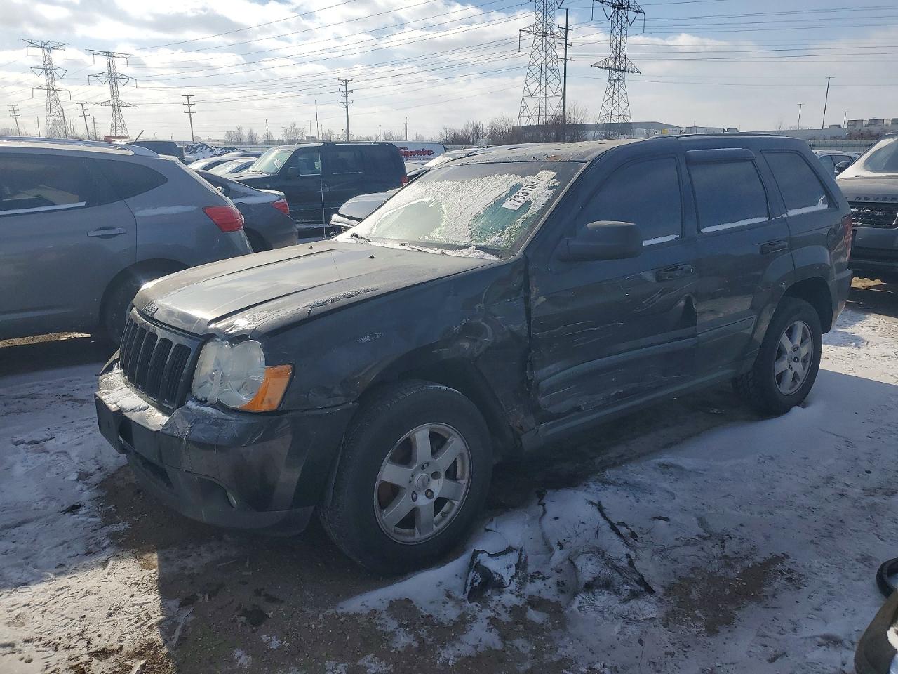 2008 Jeep Grand Cherokee Laredo, VIN 1J8GR48K58C125807 — Side