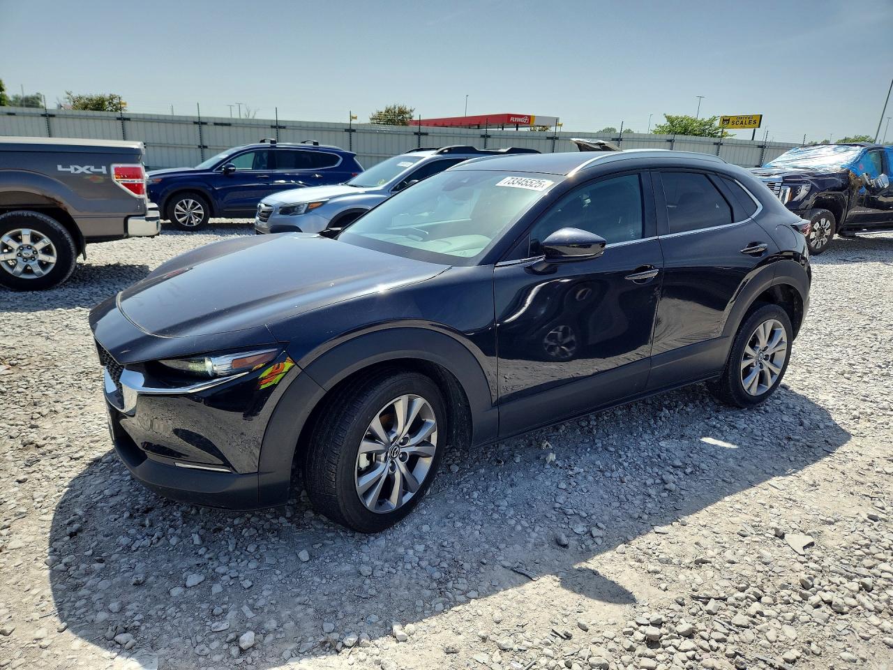 2023 Mazda CX-30 S Select, VIN 3MVDMBBM1PM532705 — Undercarriage