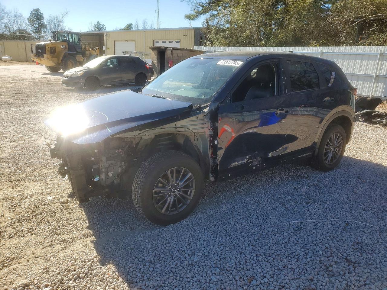 2021 Mazda CX-5 Touring, VIN JM3KFACM7M1328518 — Front end