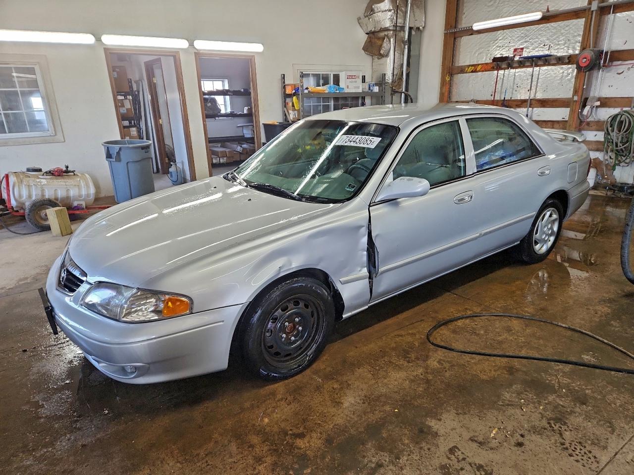 2002 Mazda 626 LX, VIN 1YVGF22D425270731 — Front end