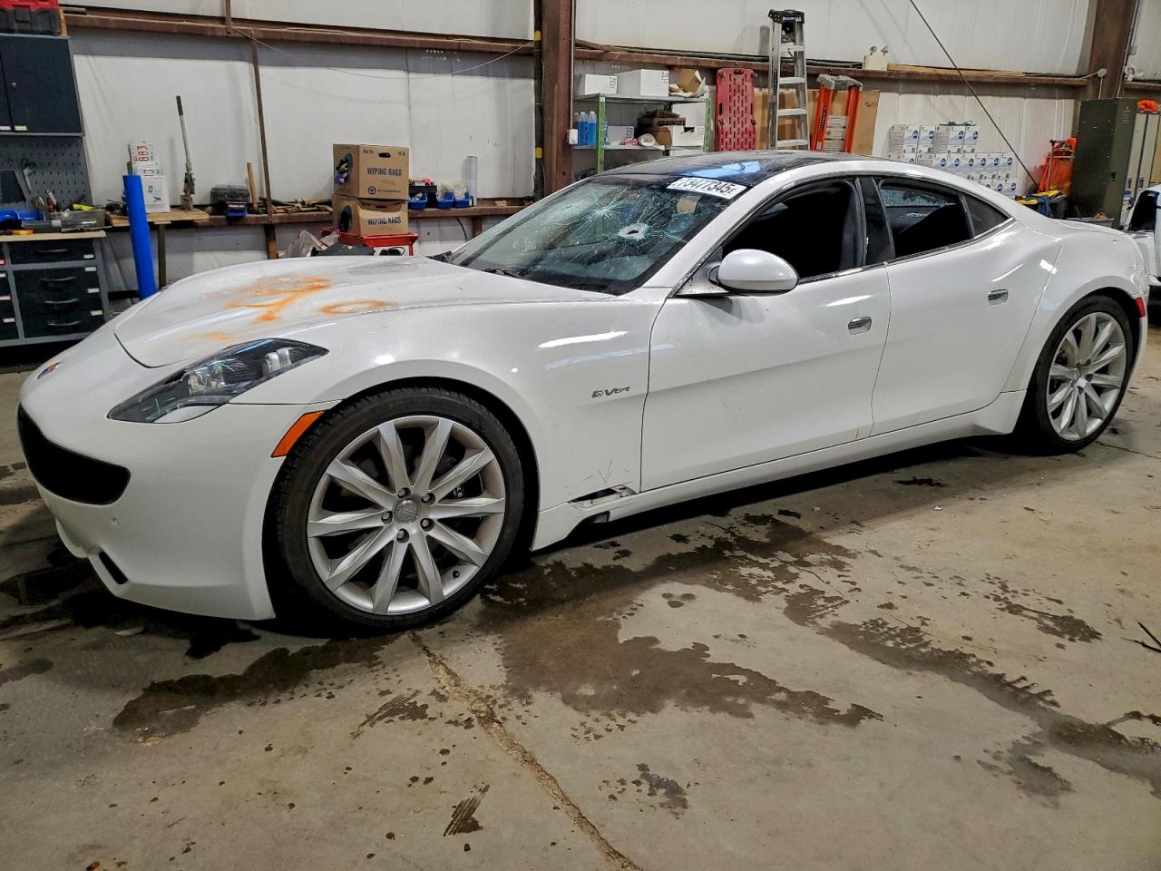 2012 Fisker Karma EcoSport, VIN YH4K14AA1CA002087 — Vandalism
