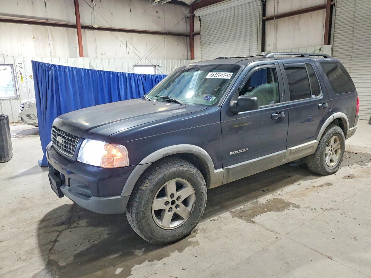 2002 Ford Explorer XLT, VIN 1FMZU73E12UA69976 — Minor dents and scratches