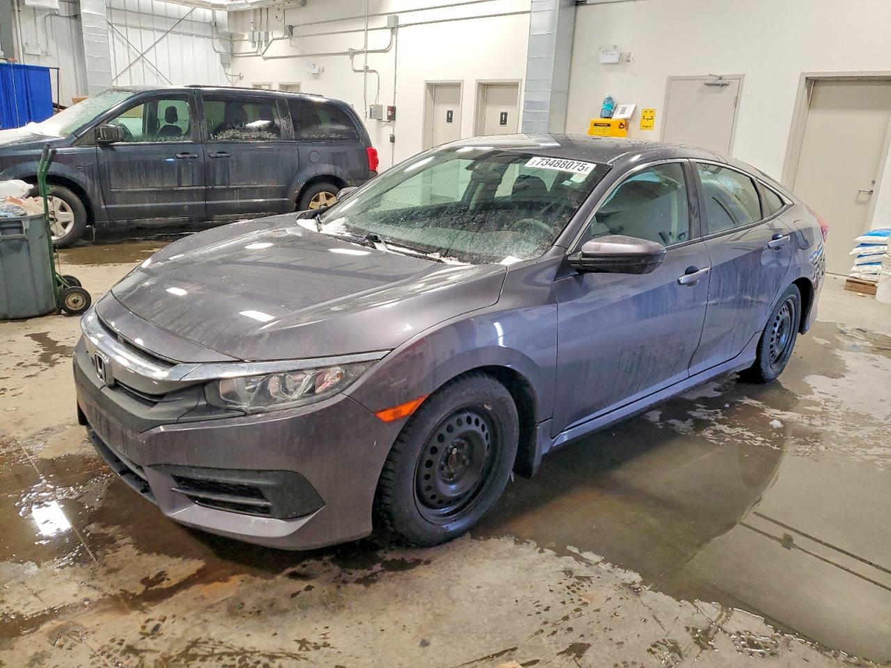 2018 Honda Civic LX, VIN 2HGFC2F5XJH038009 — Partial repair