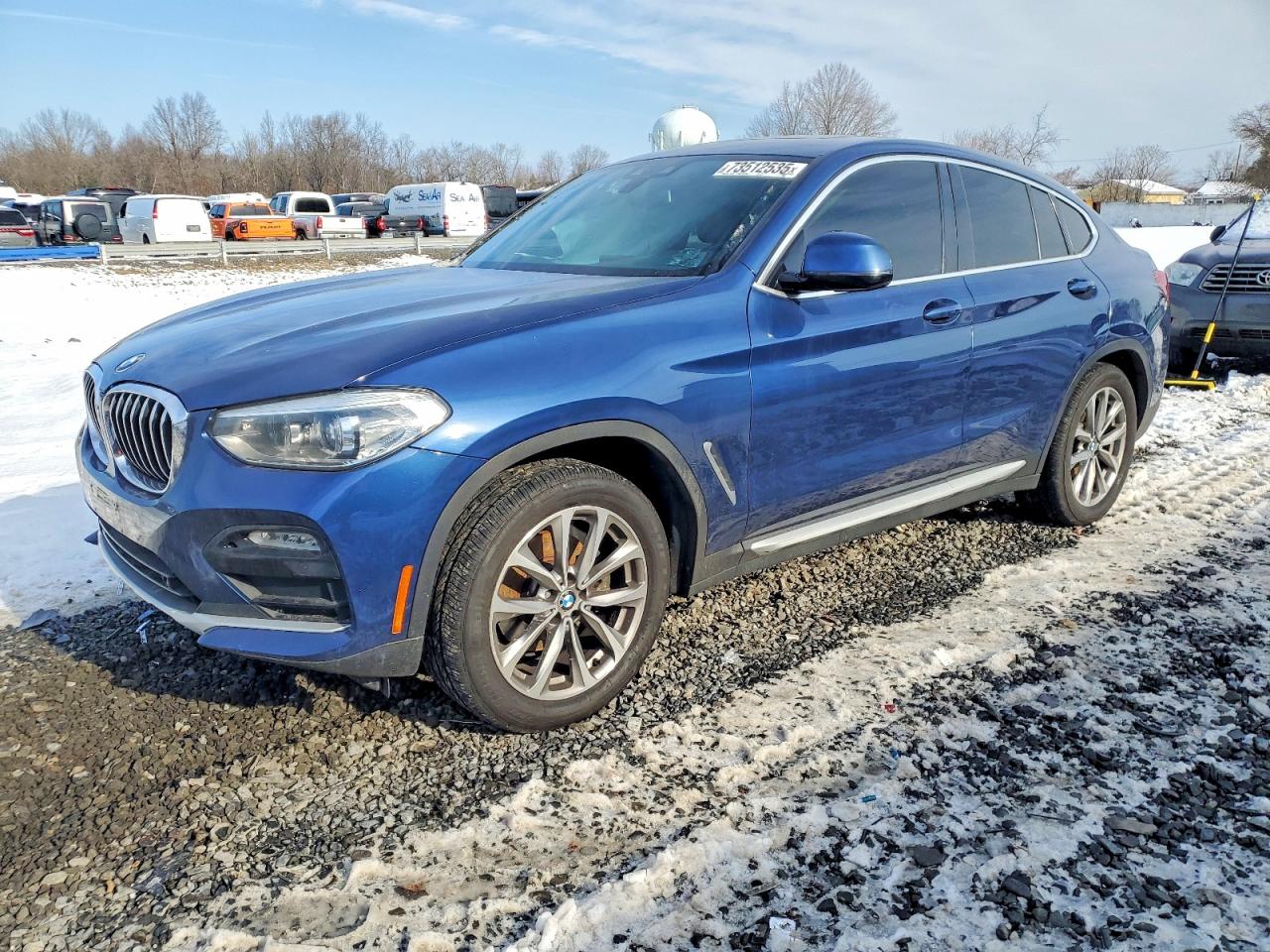 2019 BMW X4 xDrive30i, VIN 5UXUJ3C59KLG57275 — Side