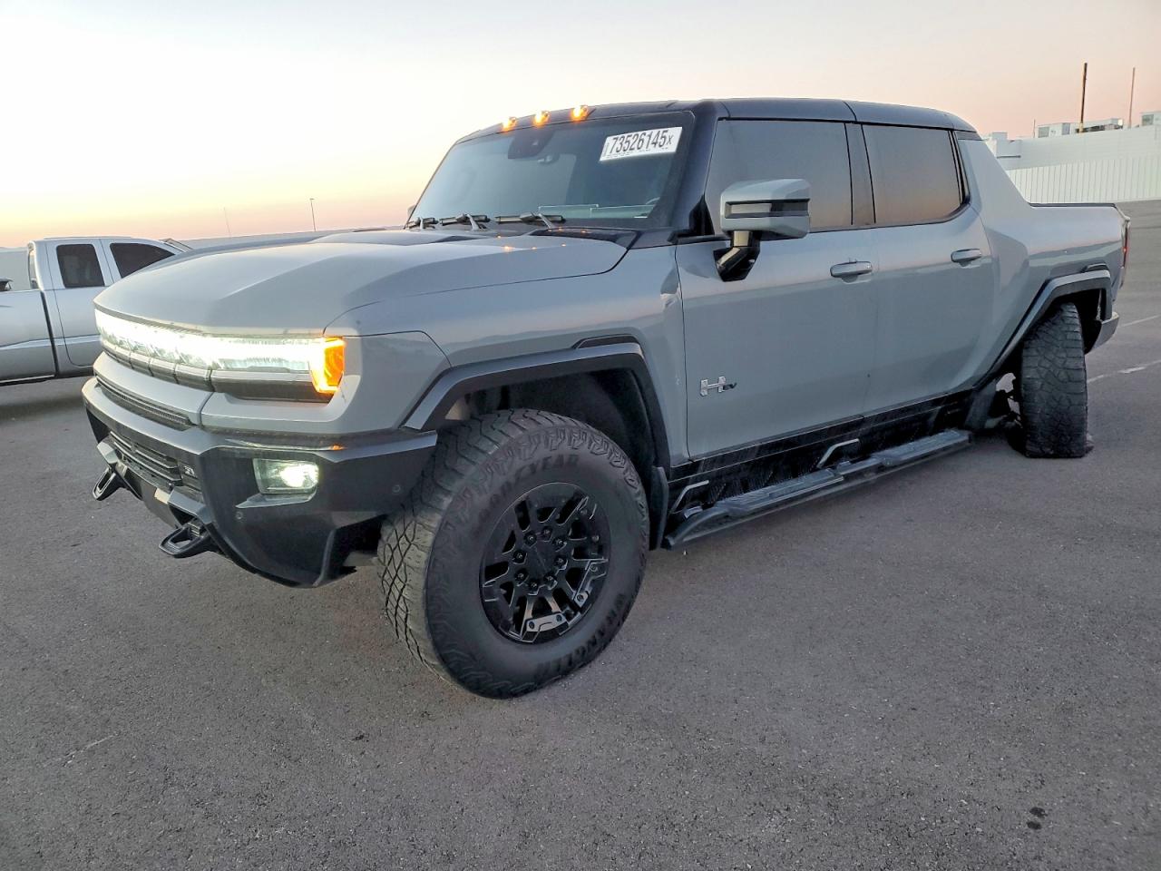 2024 GMC HUMMER EV Pickup 2X, VIN 1GT10BDD4RU114053 — Side