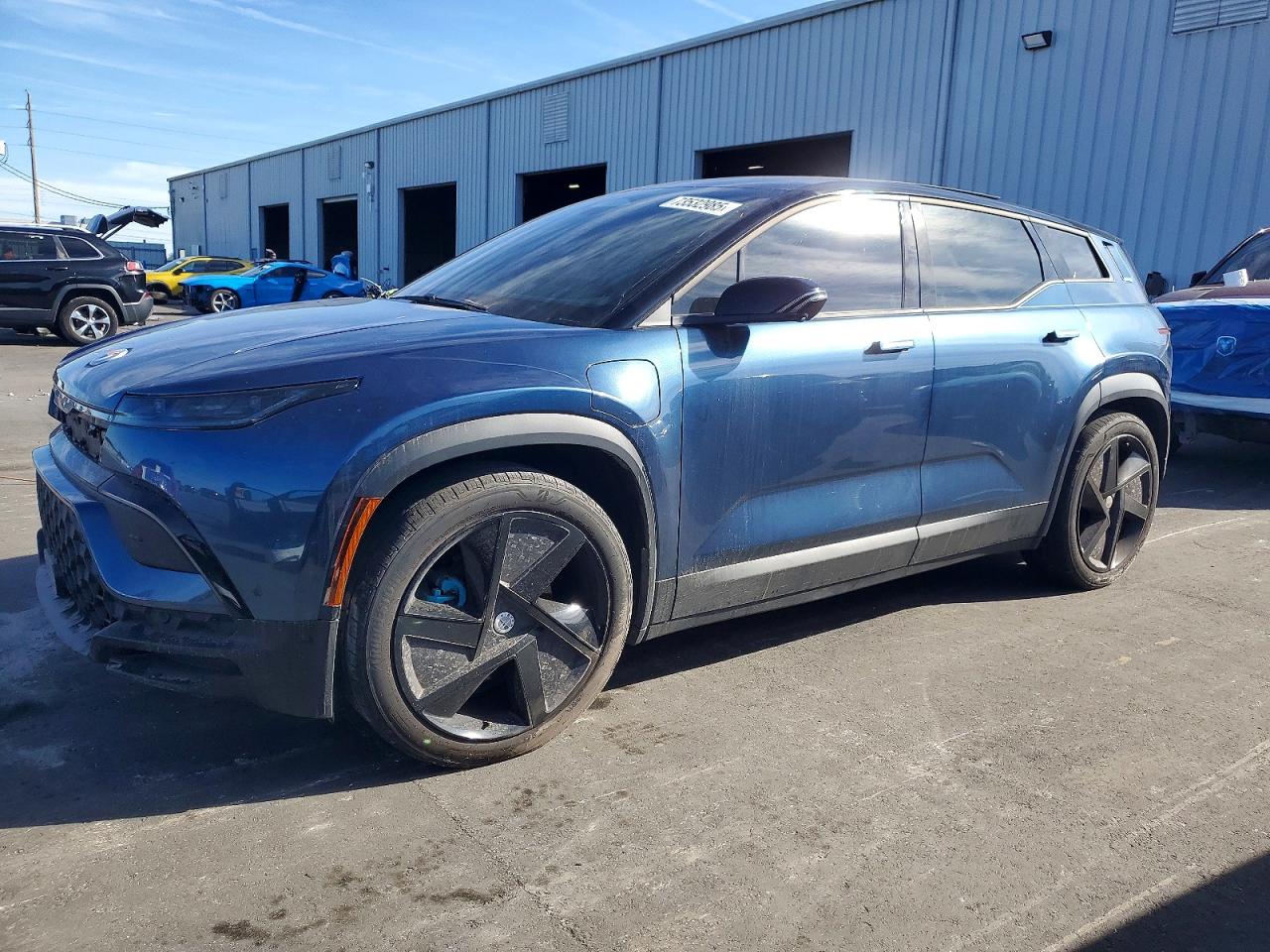2023 Fisker Ocean One, VIN VCF1ZBU22PG004585 — Side