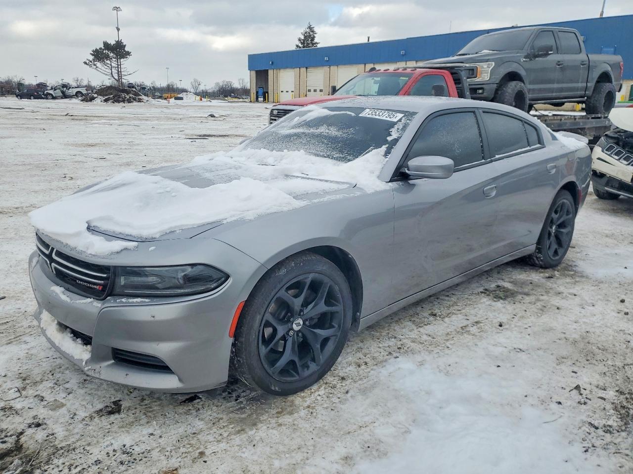 2015 Dodge Charger SE, VIN 2C3CDXBG9FH812233 — Side
