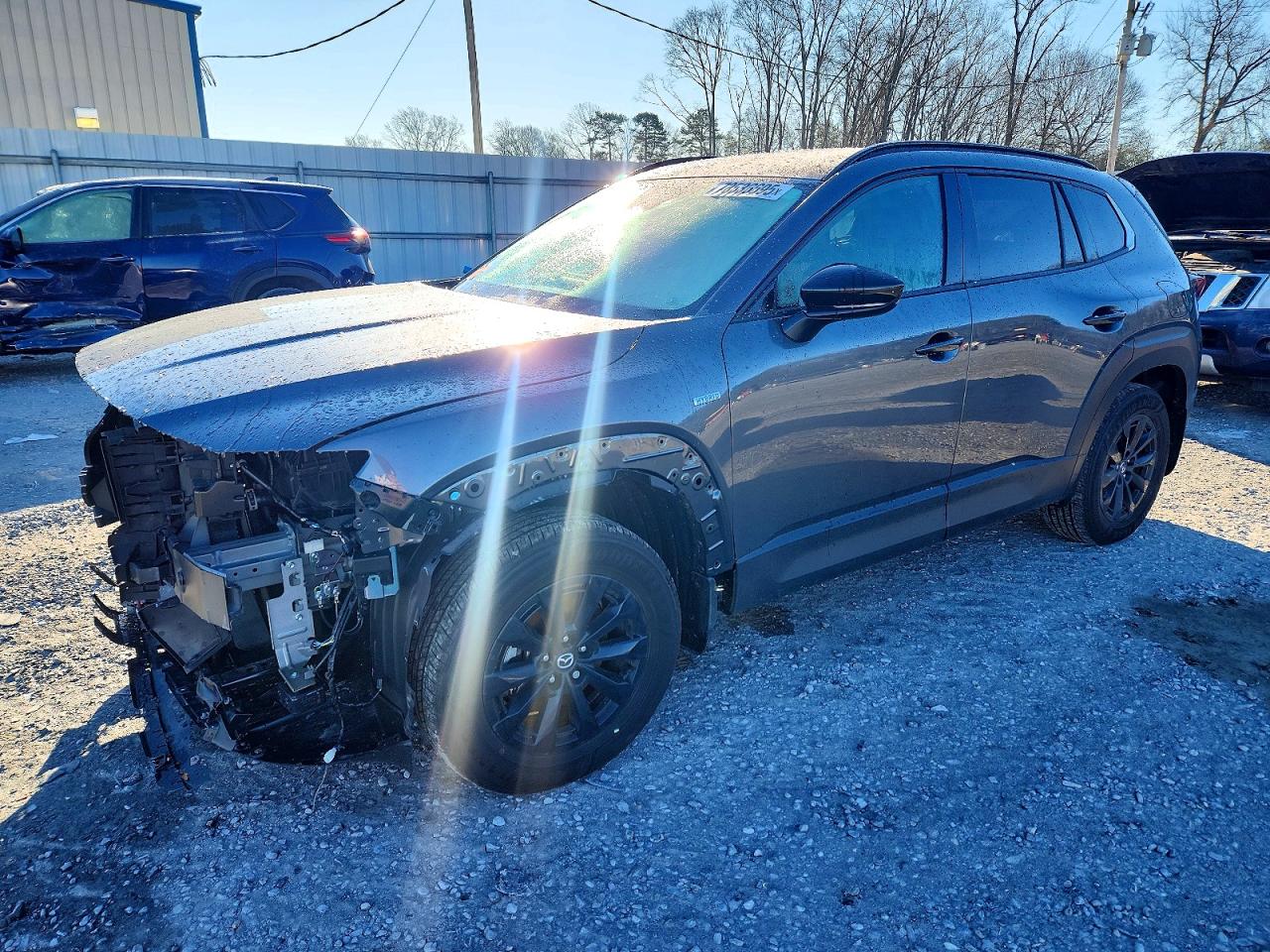 2025 Mazda CX-50 Hybrid Premium Package, VIN 7MMVAADW1SN127465 — Front end