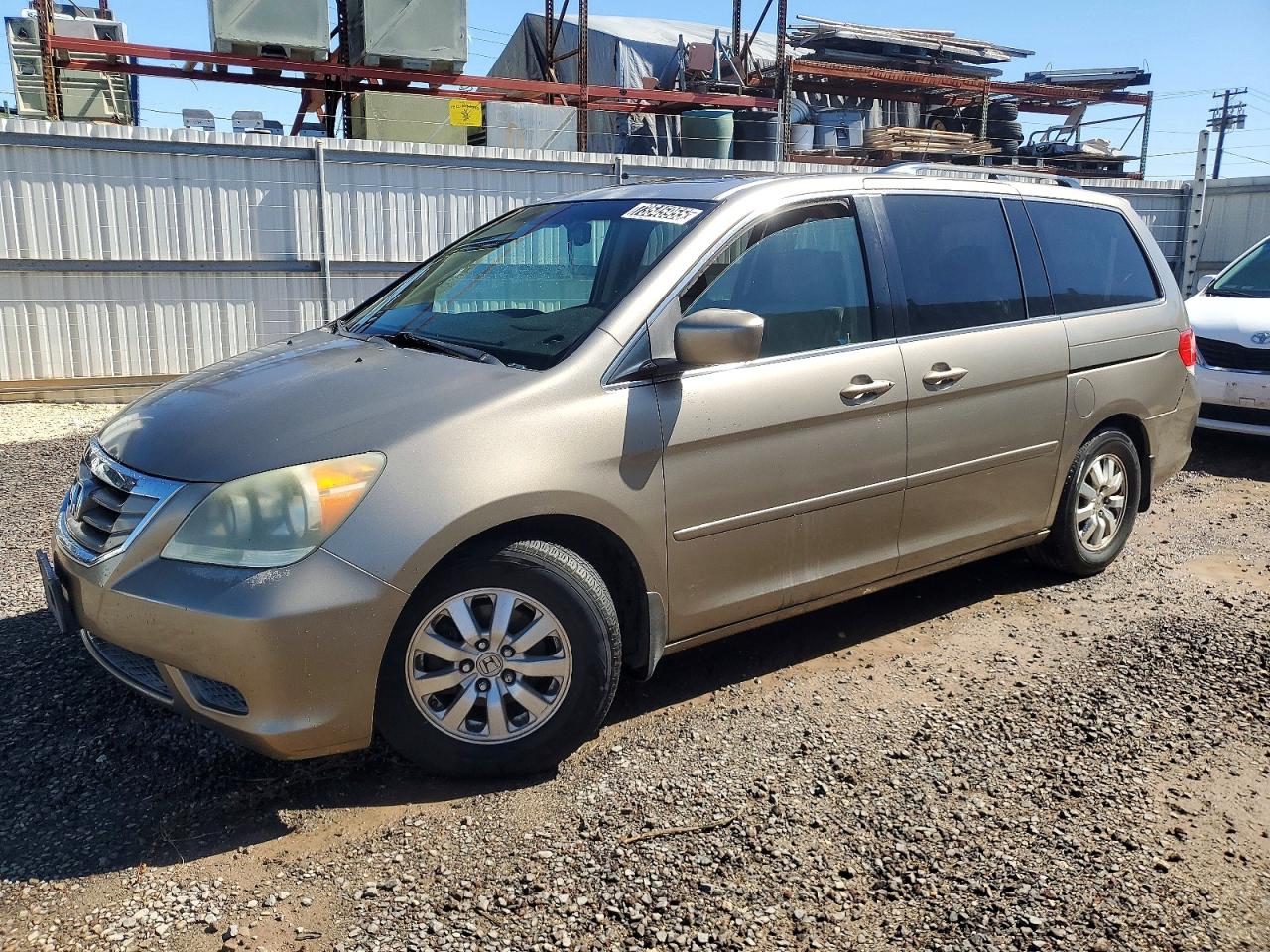 2010 Honda Odyssey EX-L, VIN 5FNRL3H63AB038172 — Auction photo 1 of 13
