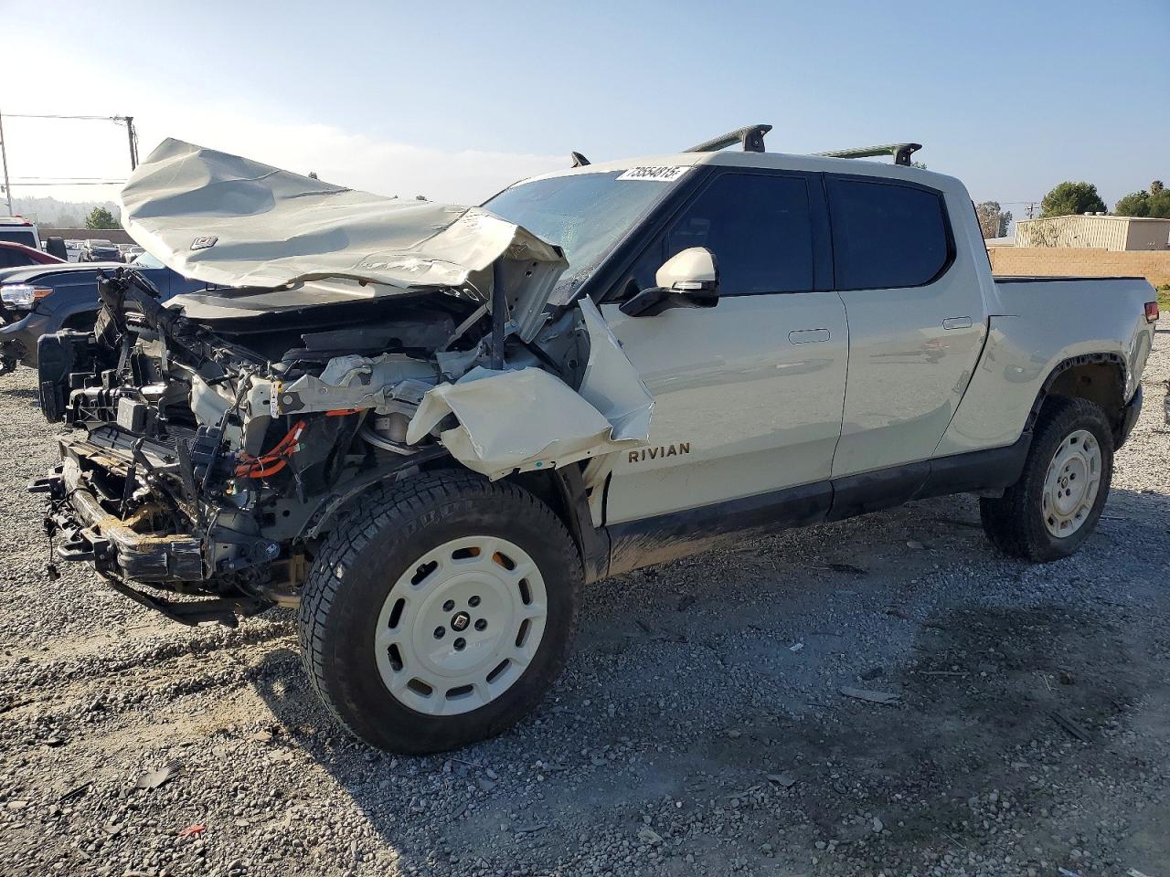 2025 Rivian R1T Adventure, VIN 7FCTGCAA8SN041297 — Rollover