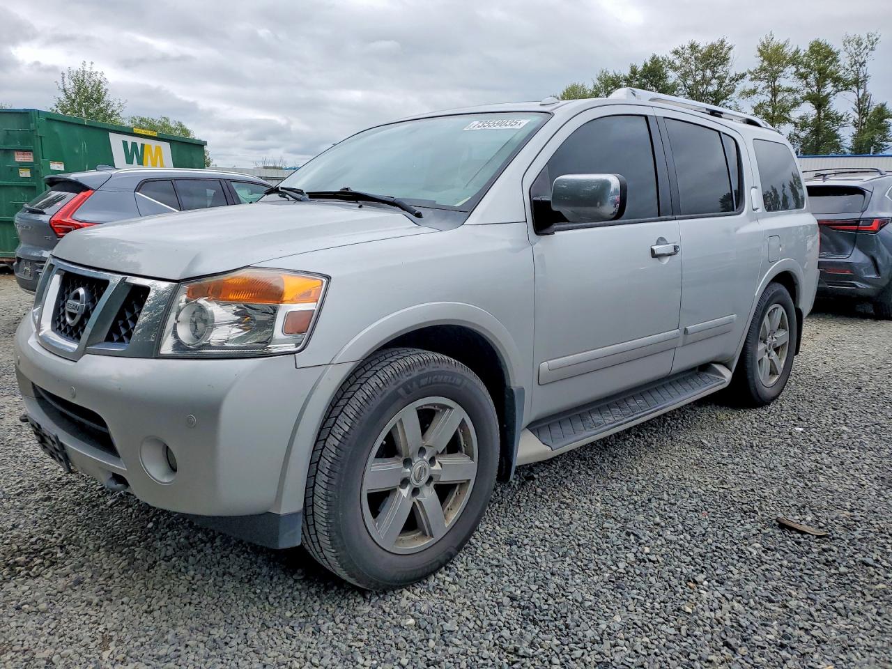 2012 Nissan Armada Platinum, VIN 5N1BA0NEXCN618715 — Side