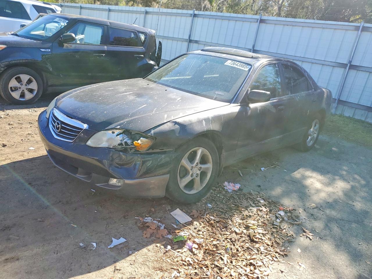 2002 Mazda Millenia P, VIN JM1TA221121733537 — Front end