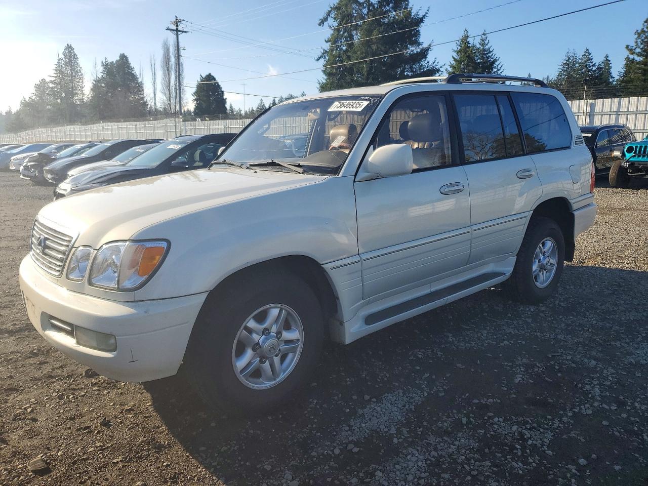 2000 Lexus LX 470, VIN JT6HT00WXY0082627 — Front end