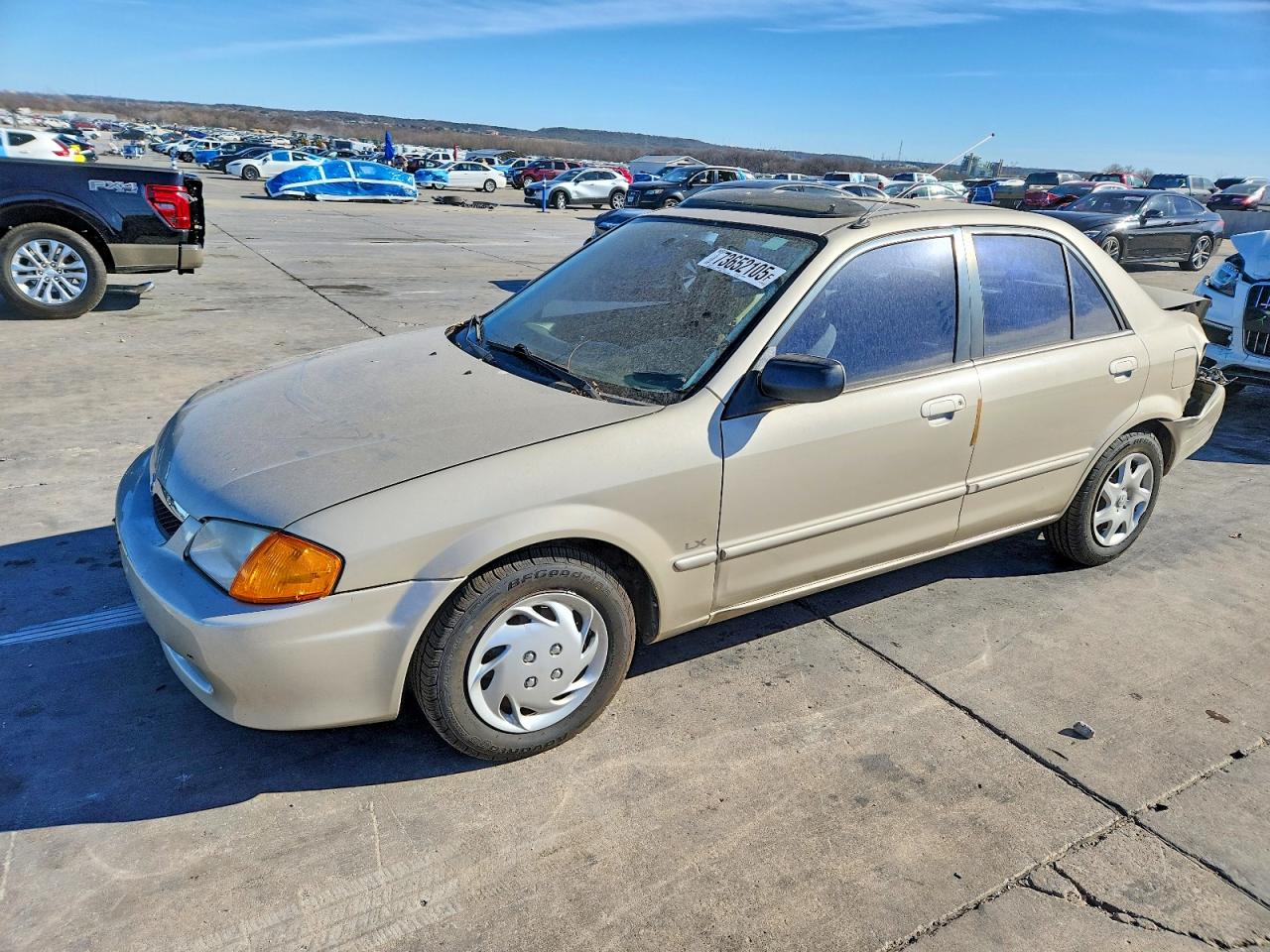 2000 Mazda Protege DX, VIN JM1BJ2220Y0242699 — Rear end